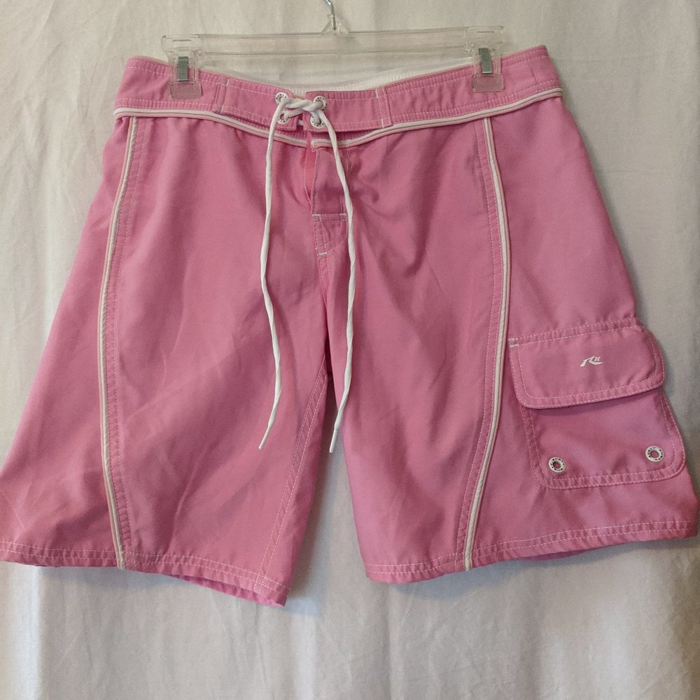 Pink board shorts with white trim